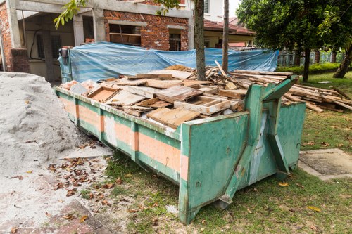 Commercial waste removal van parked outside a High Street business in Upminster